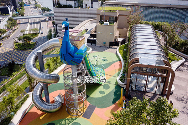 Theme park peacock themed slide