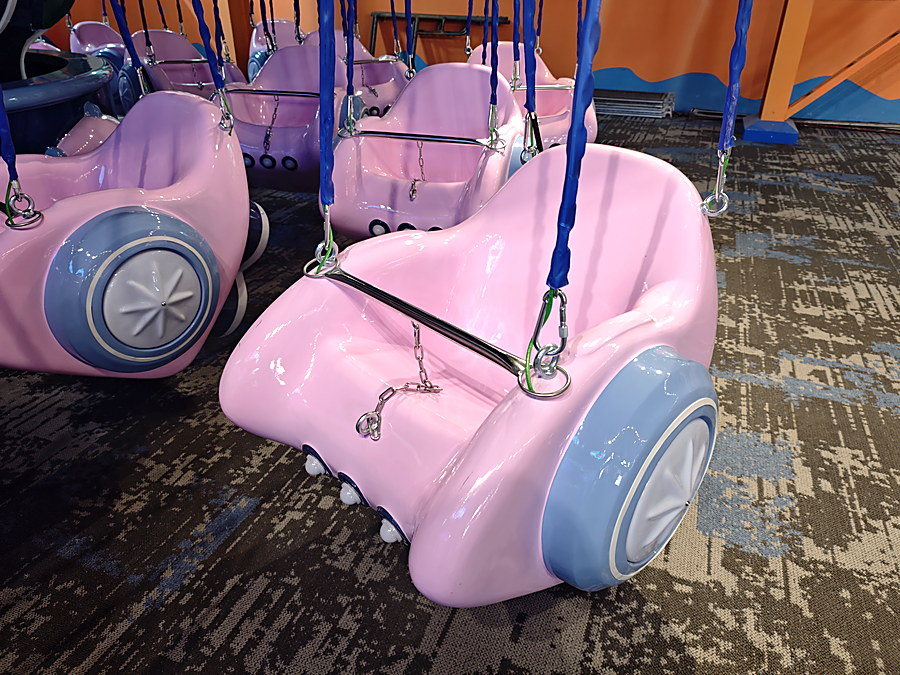 Fibreglass seats for a flying chair ride